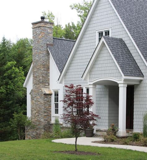 grey house exterior paint with metal roof wood posts|gray metal roof exterior.